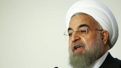 Iran President Hassan Rouhani talks during a business forum in Rome, Italy