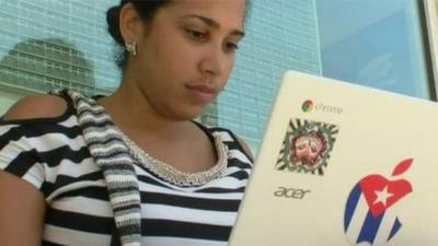 Woman using laptop.