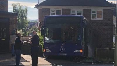 Bus crashed into house