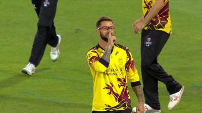Peter Trego shushes to celebrate the wicket of Alex Hales