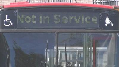 GHA Coaches bus sits idle with 'Not in service' sign showing