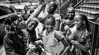 Girls eating ice cream on a NYC street