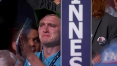 A man cries on the convention floor