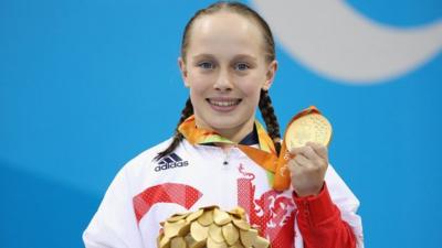 Ellie Robinson with her gold medal