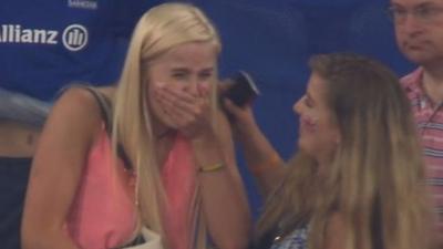 A fan crying in crowd at the London Anniversary Games