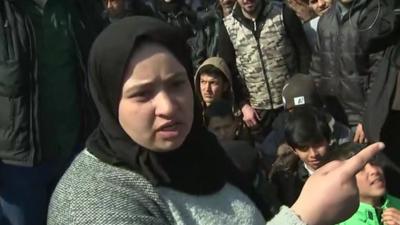 Migrant woman at border