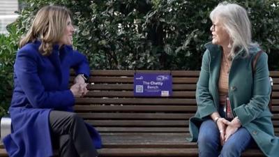 People having a conversation on a Chatty Bench