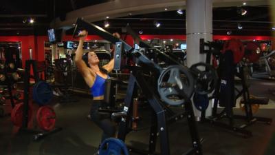 Woman exercising in the gym