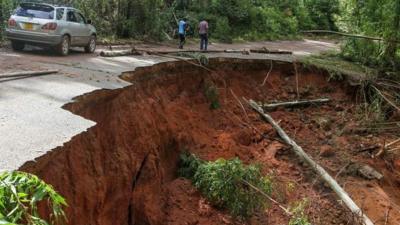 Road shown with damage inflicted by Cyclone Idai