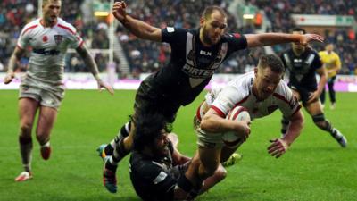 Elliot Whitehead scores his second try for England against New Zealand