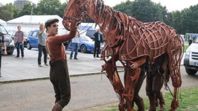 A picture of the War Horse puppet at proms in the park