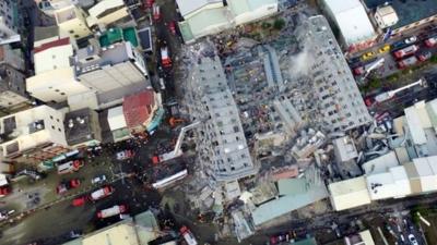 Aerial picture shows a site where buildings collapsed after a powerful earthquake hit Tainan, southern Taiwan