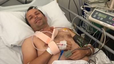 The former firefighter struggles to walk after being knocked off his motorbike.