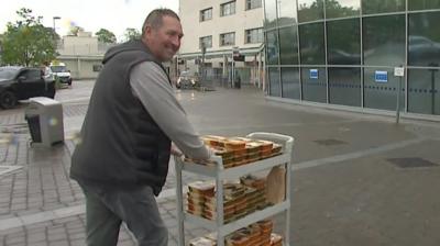 Former England captain Graham Gooch says he has been "humbled" helping to deliver food to hospitals.