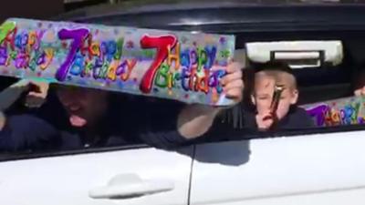 Boy in car