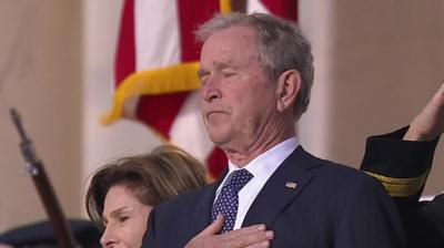 George W Bush looks emotional as his father is laid in state on 3 December 2018