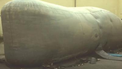 Inflatable Sperm Whale theatre being used to teach children about single-use plastic