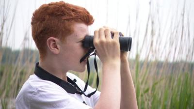 Finn with binoculars