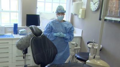 Dental nurse in PPE