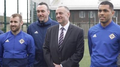 Northern Ireland players Niall McGinn (left) and Josh Magennis (right) visited Maghaberry Prison recently