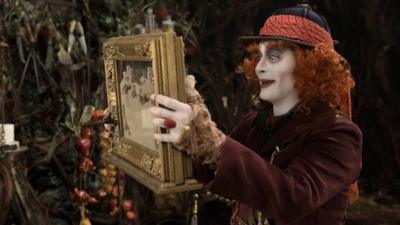 Johnny Depp as the Mad Hatter