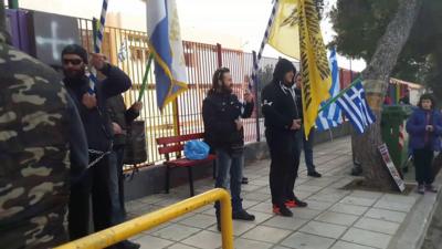 Protesters outside a school in Greece