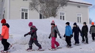 Children walking in Ii, Finland