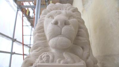 Stone carving of a lion's head