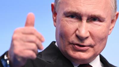 president putin giving a thumbs up