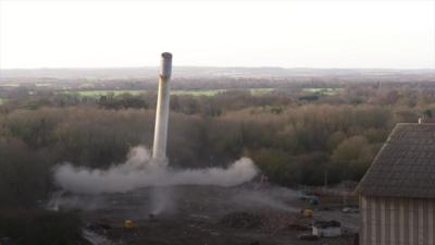 Chimney being demolished