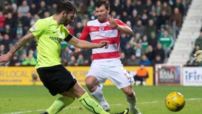 James Keatings (left) scores for Hibs