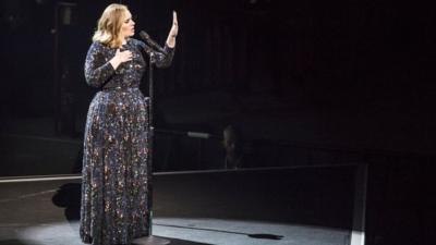 Adele performing