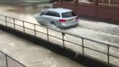 Car in flood water