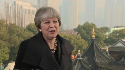 Theresa May speaking in China