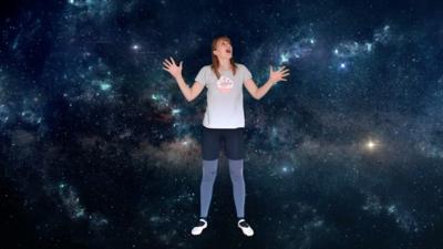 Woman dancing in space