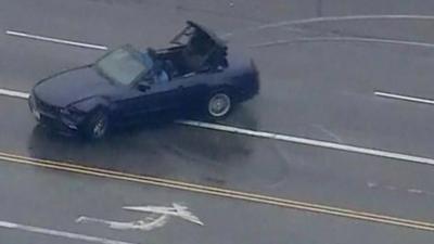 Car doing "donuts" in Hollywood