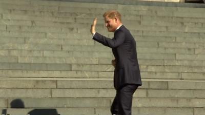 Prince Harry waving from the steps of St Paul's Cathedral