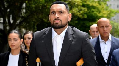 Nick Kyrgios arrives in court