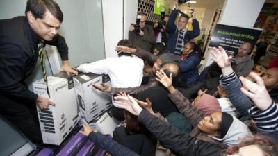 Shoppers grab for cut-price TVs