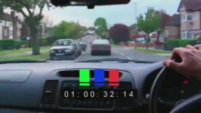 View from police car, pursuing vehicle