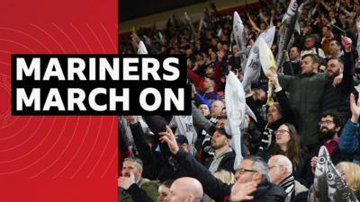 Fans celebrating Grimsby's 2-1 win