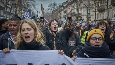 Protesters march in Paris against pension reform