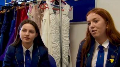 Two students with dresses