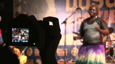 Taking a photograph at a festival in Zanzibar