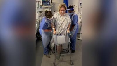 Footage of Sharron Mullinger learning how to walk again after being placed in a coma