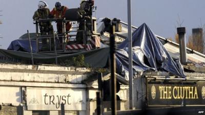 Emergency services inspect roof of the Clutha pub
