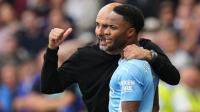 Pep Guardiola and Raheem Sterling