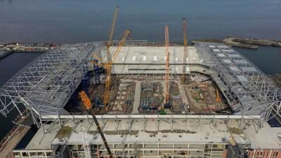 aerial view of Everton's new stadium being built against the backdrop of the River Mersey