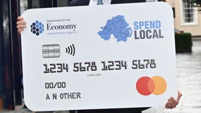 A giant version of the high street voucher