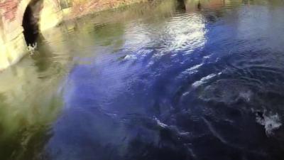 Man in river in Bury